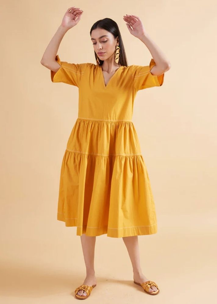 A Model Wearing Yellow Pure Cotton Wonder Amber Solid Dress, curated by Only Ethikal